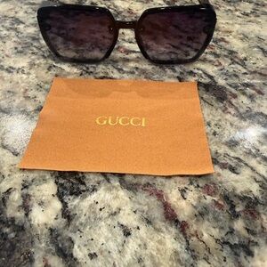 Gucci Women's Black Sunglasses with Gradient Lenses